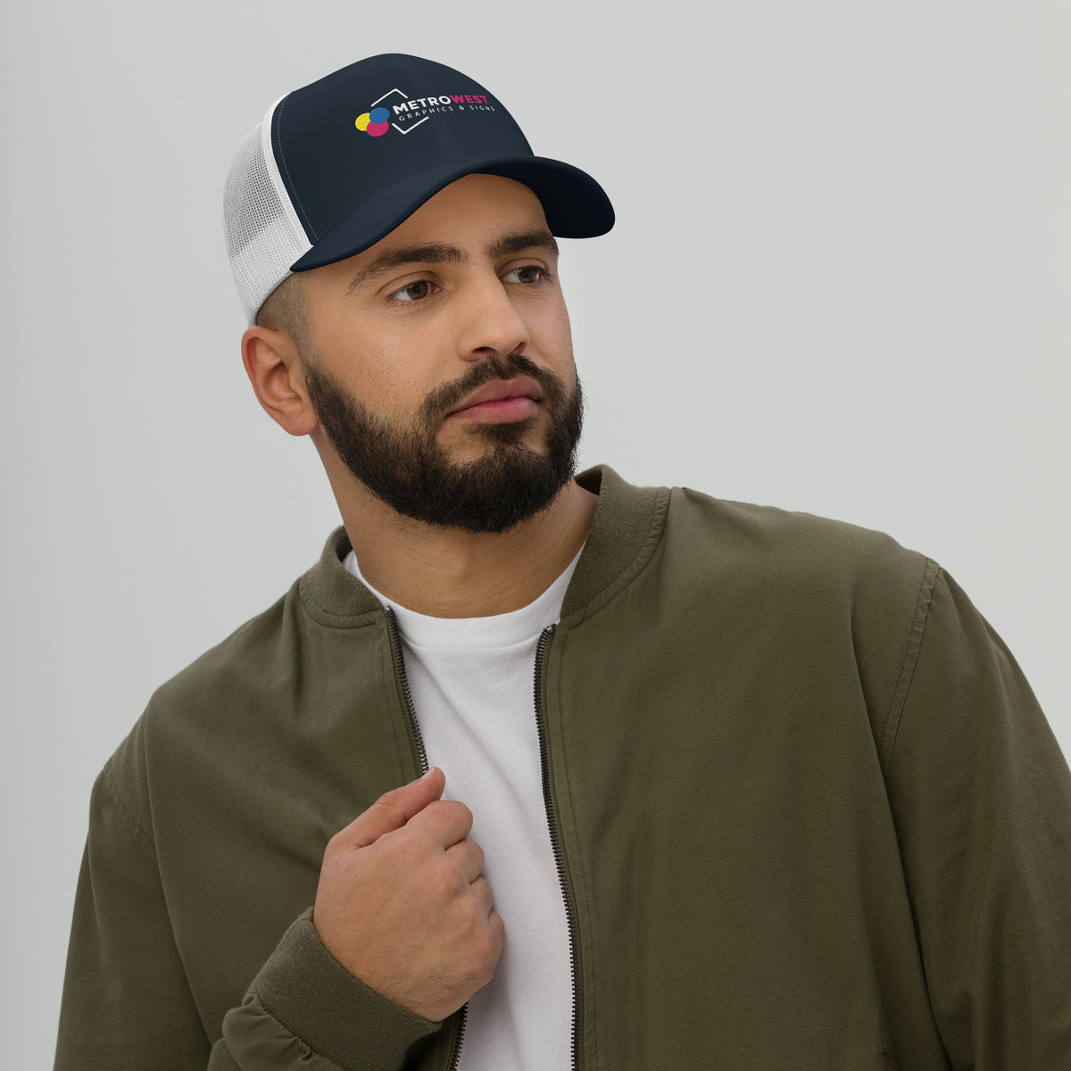 Retro trucker hat with embroidered logo on the front